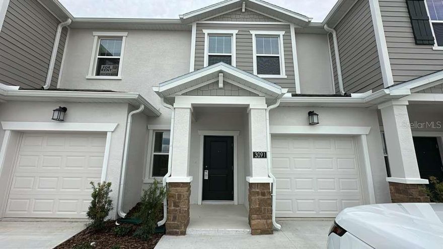 One or more photo(s) has been virtually staged. Under Construction. This new Amalfi two-story townhome has a smart layout that promotes ease of living. A versatile flex space frames the foyer by the front door while down the hall is an open concept living area with direct access to a lanai. Upstairs hosts all three bedrooms, including the spacious owner’s suite with a spa inspired bathroom and fabulous walk-in closet. With “Everything’s Included”, luxury and value go hand in hand. Enjoy connectivity, green building features, plus new energy conscious appliances. Welcome to Wellness Ridge the community that was designed to provide a Healthy & Active Lifestyle!! Community Features include: Sports Courts, Clubhouse, Fitness Center, Conservation Areas, Playground, Resort Style Swimming Pool and Multi-Use Trails. This beautiful home is very close to Lake Louisa State Park. Clermont is one of the fastest-growing cities in Central Florida. Strategically located close to Orlando and theme parks, it is known for its picturesque hills and pristine lakes. Schedule your appointment today!