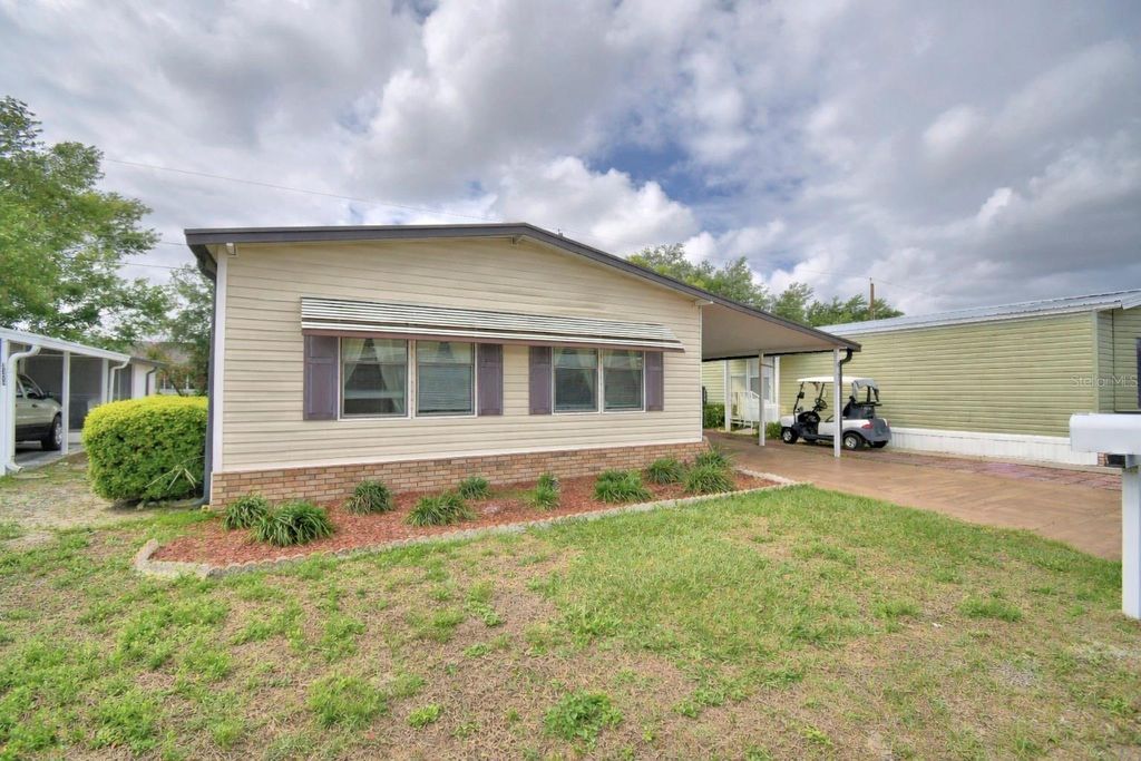 Photo of 4173 Rolling Oaks Drive, Winter Haven, FL 33880 (MLS # P4938419)