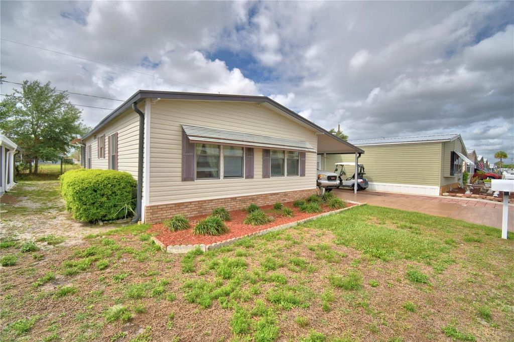 Photo of 4173 Rolling Oaks Drive, Winter Haven, FL 33880 (MLS # P4938419)