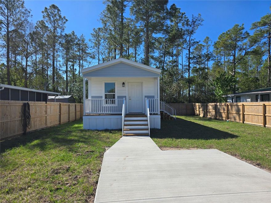 Brand-new Palm Harbor home featuring stainless steel appliances, high ceilings, and an open living area designed for comfortable tiny home living. Enjoy relaxing on the inviting front porch while taking in the peaceful surroundings. Situated on a fenced lot for privacy with a beautiful yard, this home offers an easy-to-maintain lifestyle and includes a home warranty for added peace of mind. Financing available!
Conveniently located in Astor, just minutes from the library, park, and public boat ramp, providing easy access to the St. Johns River and outdoor recreation. Whether you're looking for a winter retreat, full-time residence, or retirement getaway, this home offers comfort, simplicity, and convenience in a quiet setting. Seller holds an active real estate license.