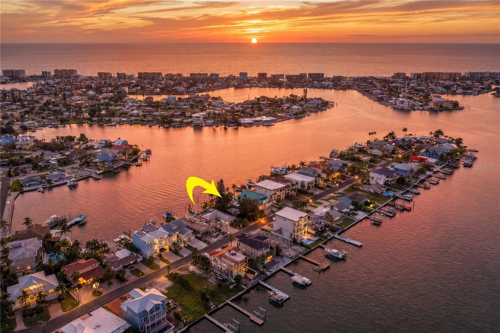 Photo of 835 Bay Point Drive, Madeira Beach, FL 33708 (MLS # TB8553697)