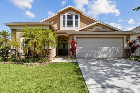 Photo of 34828 Prairie Ridge Way, Zephyrhills, FL 33541 (MLS # TB8415410)
