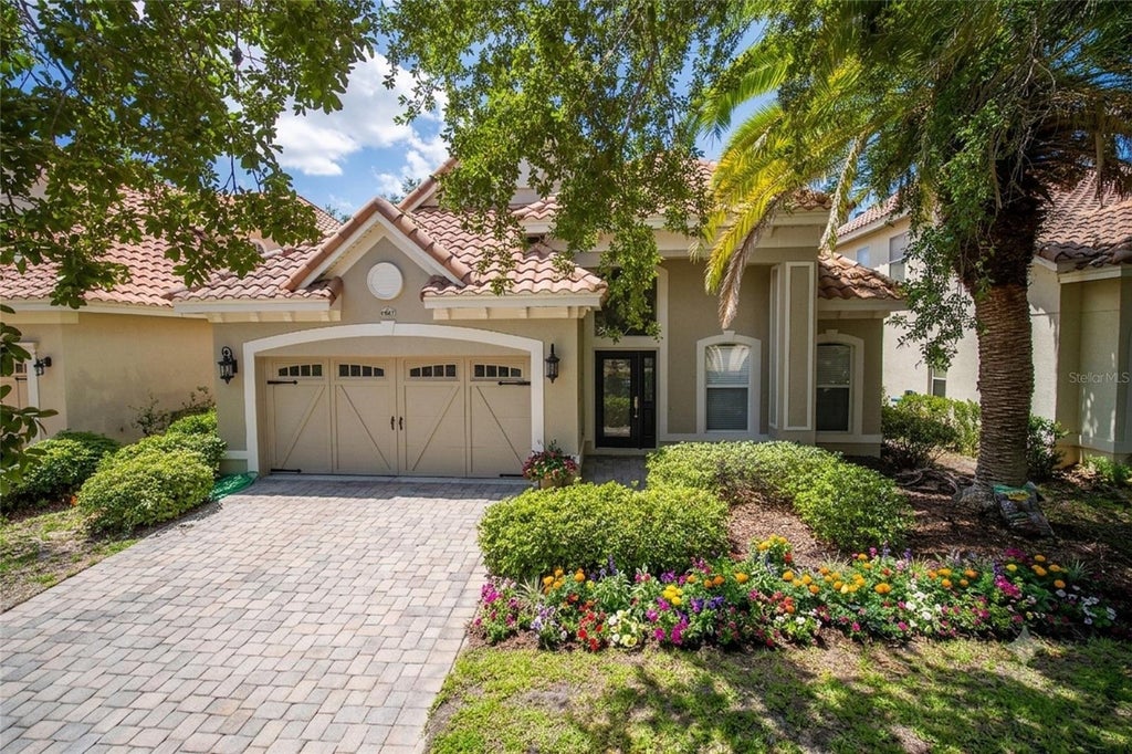 Photo of 6967 Brescia Way, Orlando, FL 32819 (MLS # O6420474)