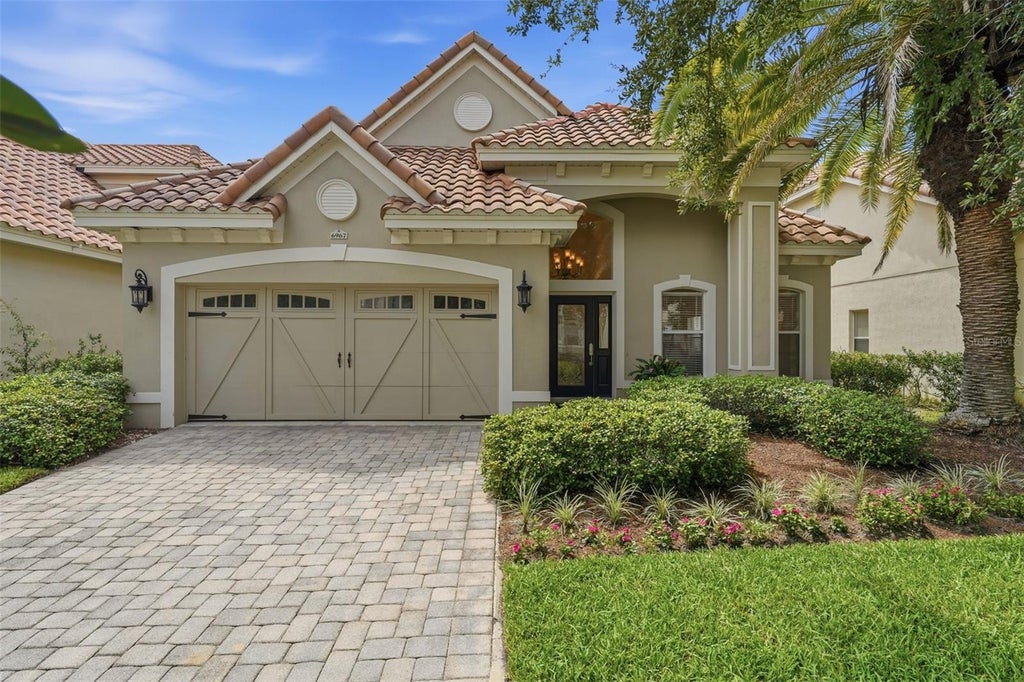 Photo of 6967 Brescia Way, Orlando, FL 32819 (MLS # O6420474)