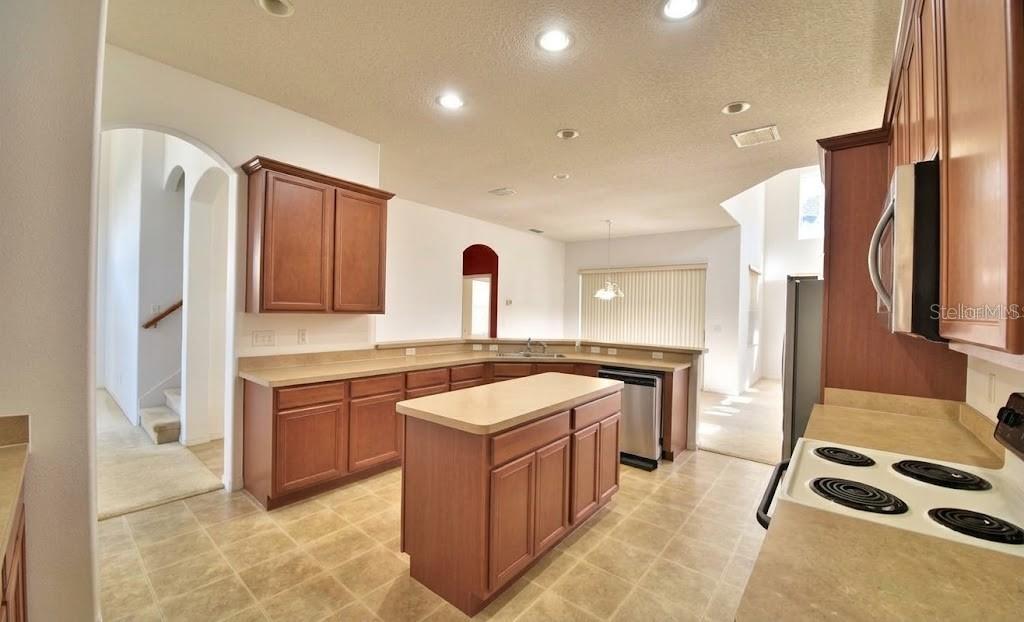 Photo of 13332 Meadow Bay Loop, Orlando, FL 32824 (MLS # O6437633)