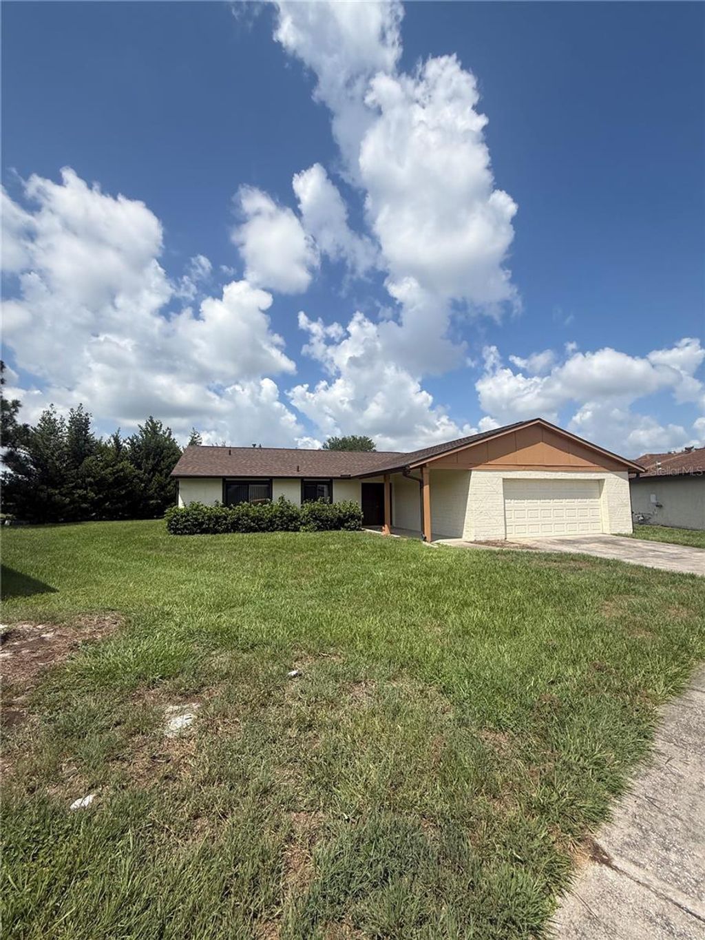 Photo of 10719 Lazy Lake Drive, Orlando, FL 32821 (MLS # O6419682)