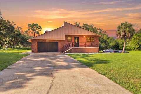 Photo of 28850 Lindenhurst Drive, Wesley Chapel, FL 33544 (MLS # W7888922)