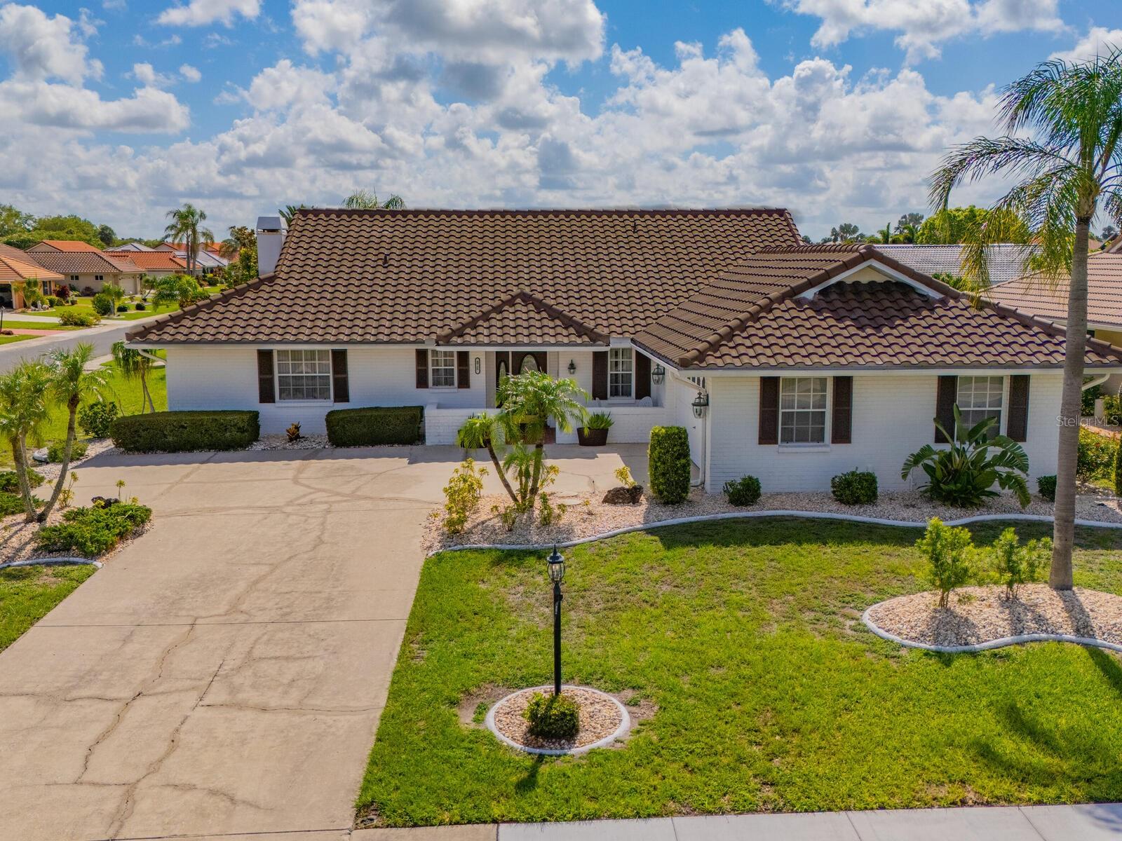 Welcome to your sunny slice of paradise in the Greenbriar community of Sun City Center! This well-kept 3-bedroom, 2-bath ranch sits on a spacious corner lot in one of the area’s most desirable 55+ neighborhoods. With a split floor plan, it offers the perfect mix of privacy and comfort—ideal for full-time living or a seasonal escape.
Inside, you’ll find a bright and open living room filled with natural light and neutral tones. The large kitchen flows into a flexible family room—great for entertaining, relaxing, or enjoying your favorite hobbies. The primary suite is a true retreat with its own sitting area and cozy FIREPLACE , perfect for quiet mornings or winding down at night.
Two additional bedrooms offer plenty of space for guests, a home office, or craft room. The guest bath features a roomy vanity and a tub/shower combo. Major updates include a BRAND-NEW ROOF with transferable warranty and a NEW A/C SYSTEM for year-round comfort and peace of mind.
Living in Greenbriar means enjoying all of Sun City Center’s amazing amenities—clubhouses, pools, fitness centers, pickleball, trails, and a pet park. Many residents get around by golf cart, adding a fun twist to everyday errands. Shopping, dining, and major highways are just minutes away.
Don’t miss your chance to enjoy easy Florida living in a vibrant and active community. Most furniture conveys—schedule your private showing today!