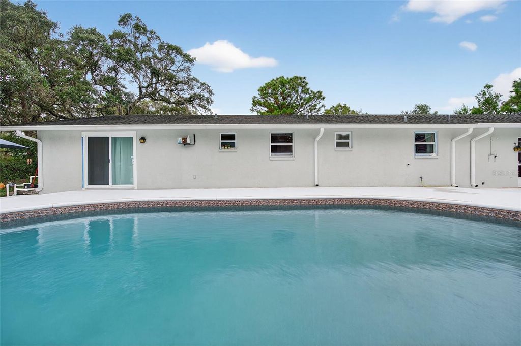 Photo of 17504 Thomas Boulevard, Hudson, FL 34667 (MLS # W7878882)