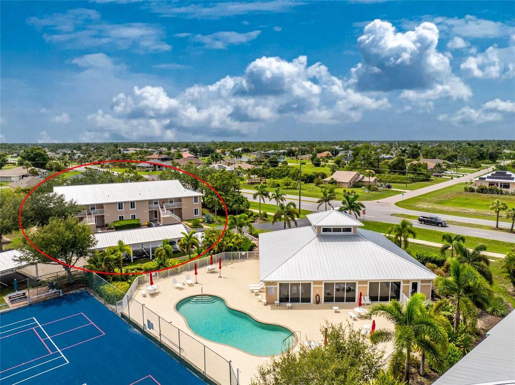 Photo of 9500 Fiddlers Green Circle #101, Rotonda West, FL 33947 (MLS # D6148145)