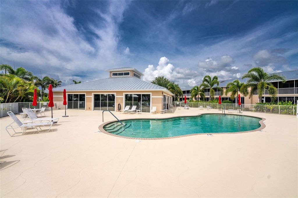 Photo of 9500 Fiddlers Green Circle #101, Rotonda West, FL 33947 (MLS # D6148145)