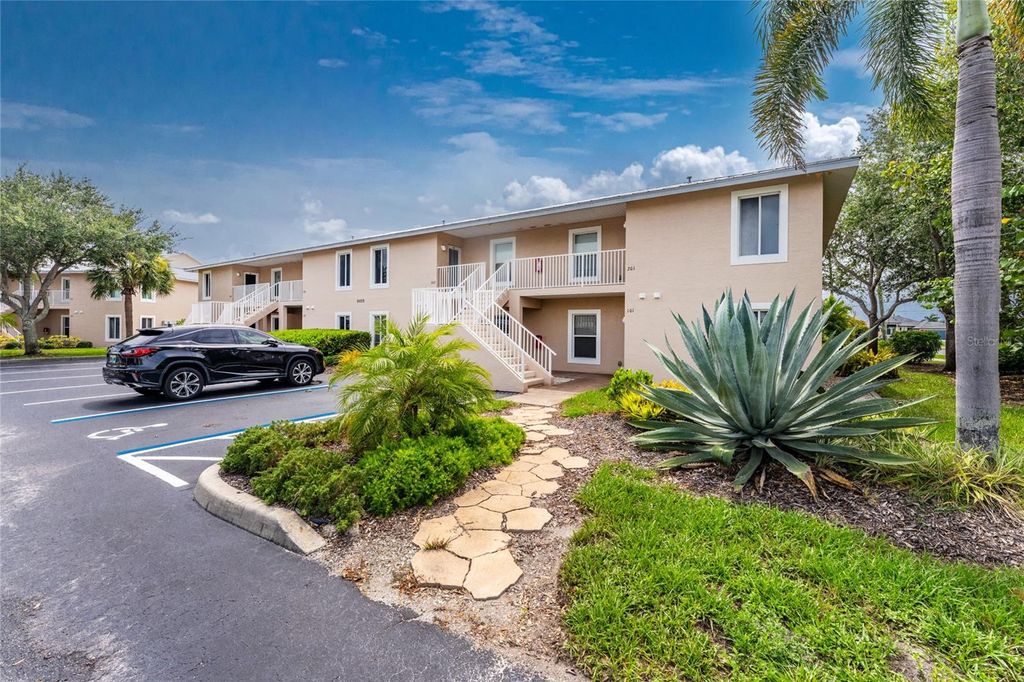 Photo of 9500 Fiddlers Green Circle #101, Rotonda West, FL 33947 (MLS # D6148145)
