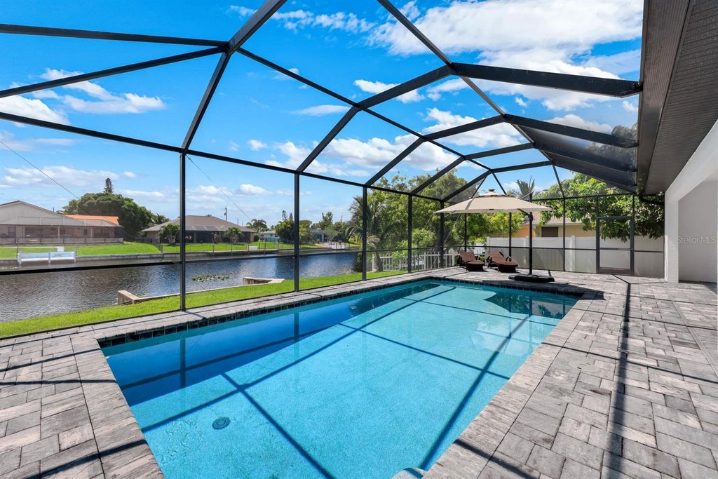 Photo of 2126 NE 2nd Street, Cape Coral, FL 33909 (MLS # TB8552807)