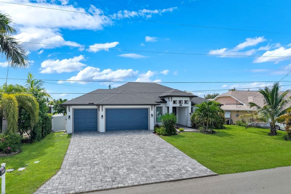 Photo of 2126 NE 2nd Street, Cape Coral, FL 33909 (MLS # TB8552807)