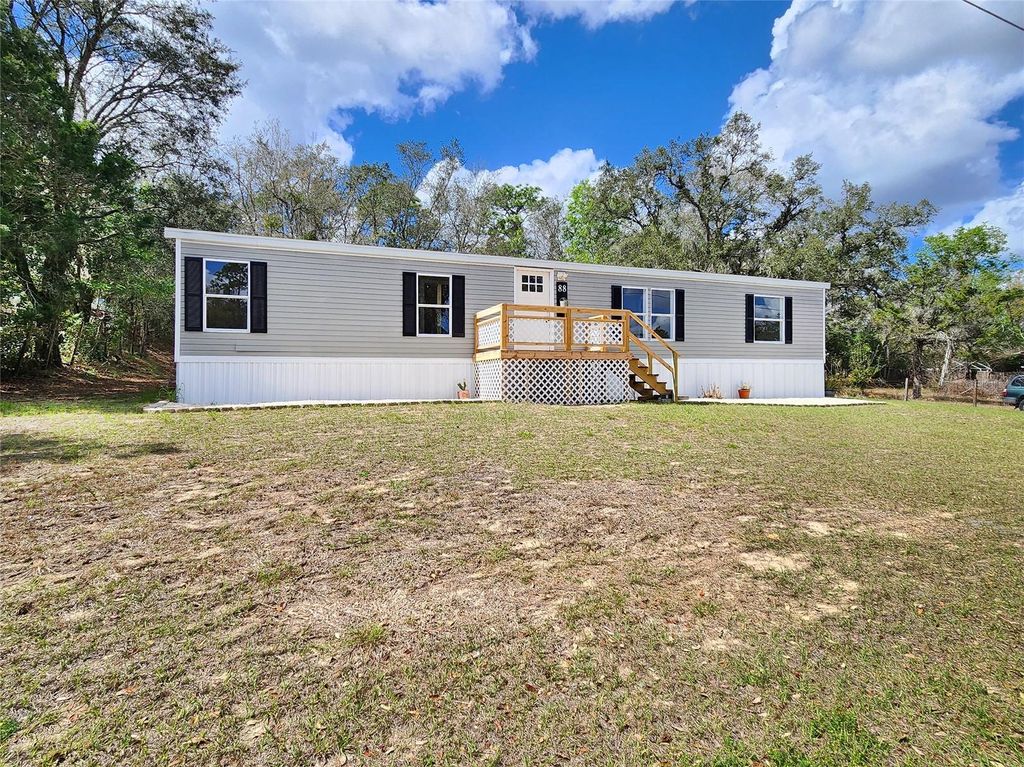 Photo of 88 N Saturn Avenue, Inverness, FL 34453 (MLS # TB8485279)