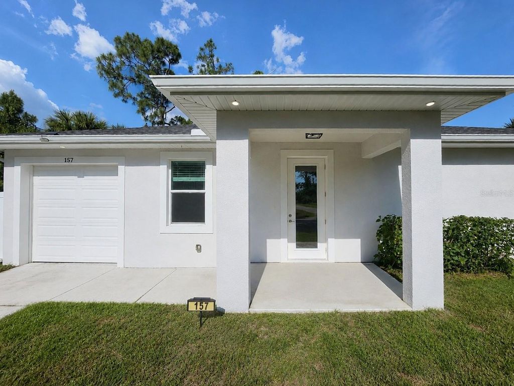 Photo of 157 Karlow Avenue S, Lehigh Acres, FL 33974 (MLS # C7525983)