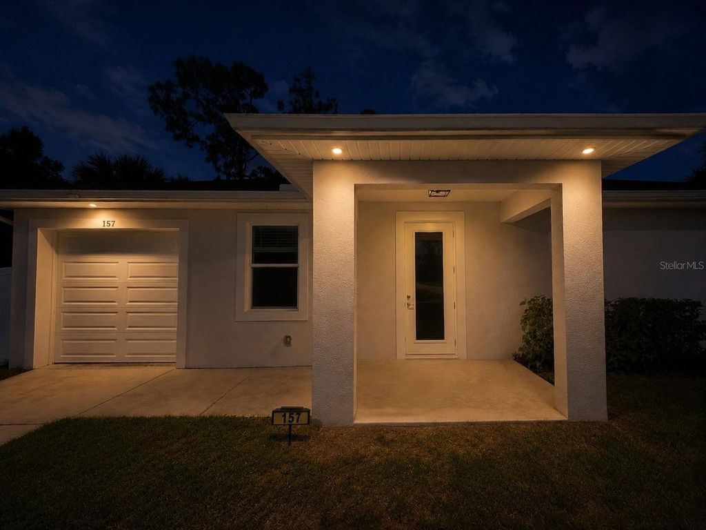 Photo of 157 Karlow Avenue S, Lehigh Acres, FL 33974 (MLS # C7525983)
