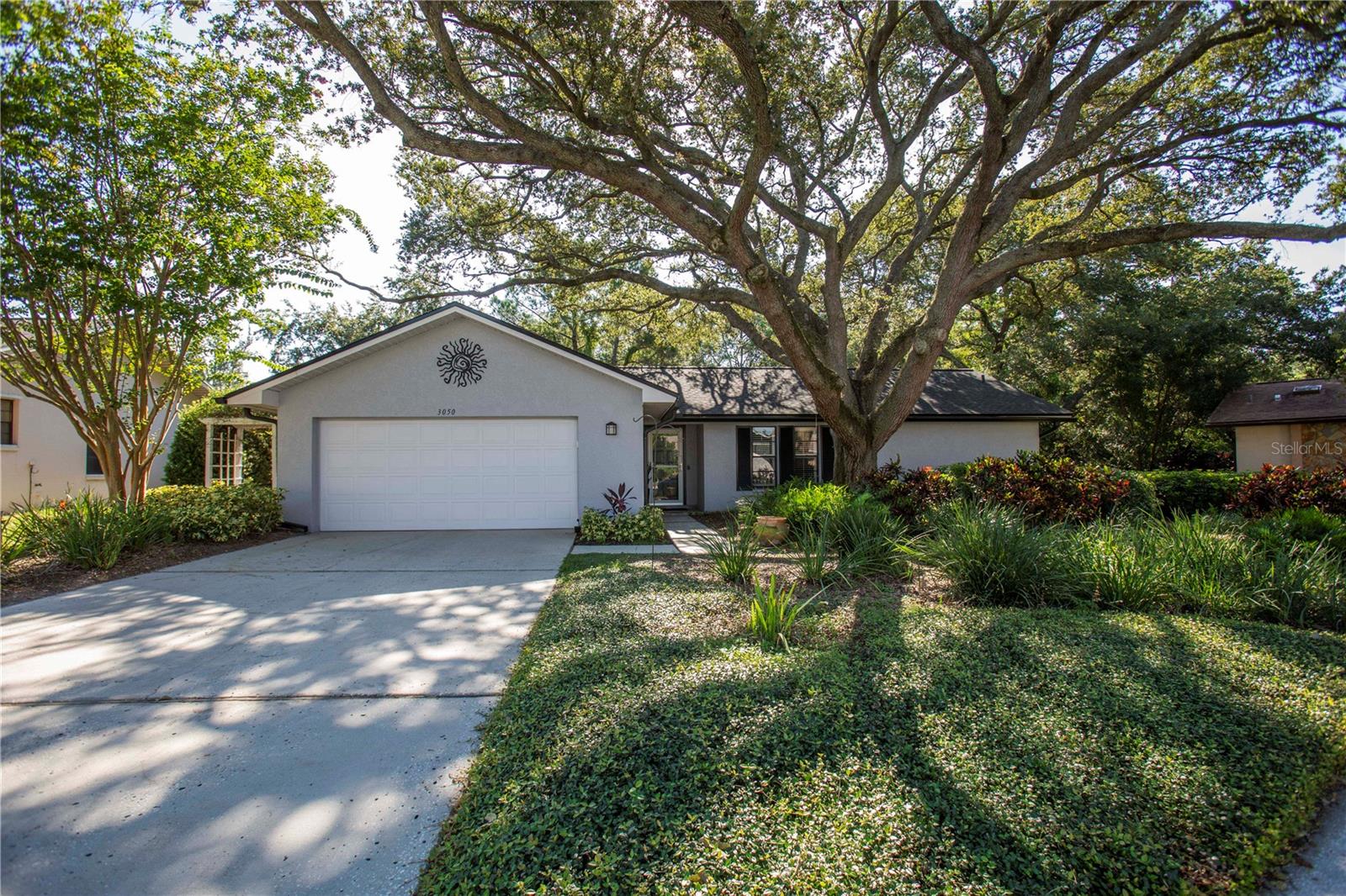 ** Meticulously Maintained Pool Home in Highly Desirable Baywoods II– Safety Harbor**
Nothing has been overlooked in this beautifully maintained 3-bedroom, 2-bath pool home located in the sought-after Baywoods II community in charming Safety Harbor. Step inside and enjoy the split floor plan, featuring a formal living and dining room combo with a quaint area for Coffee Bar or Wine bar, plus a separate family room off the kitchen—perfect for families and entertaining. The light and bright kitchen offers wood soft-close cabinetry, granite countertops, a custom built-in pantry with pull-out drawers, stainless steel appliances, and a convenient pass-through window to the pool area. Perfect for entertaining or just a nice Family BBQ. The kitchen opens seamlessly to the main living area and cozy eat-in space, enhanced by a traditional wood-burning fireplace in the combined Family Room. Multiple doors provide natural light and easy access to the pool and patio, making indoor-outdoor living a breeze. Both bathrooms have been tastefully updated with wood cabinetry, quartz countertops, and stylish ceramic wood-look ceramic tile flooring .The home has a Kinetico water conditioning system that supplies soft water and filters out the chlorine. The park-like backyard is a true Florida oasis, featuring lush landscaping and mature pineapple plants galore. Additional highlights include:
• Sparkling screened-in pool & patio – an entertainer’s dream
• Inside laundry room
• Wooded backyard offers much privacy
• Newer roof for peace of mind
• Not in a flood zone + very low optional HOA
Just under a mile from Philippe Park, where you can enjoy nature trails, picnics, fishing, and boat ramps. Safety Harbor is a golf-cart-friendly community with year-round festivals, waterfront parks, marinas, and a quaint downtown full of shops, restaurants, and the world-renowned Safety Harbor Spa. Centrally located with easy access to Tampa International Airport, St. Pete-Clearwater Airport, Clearwater Beach, and Honeymoon Island. This home truly offers the perfect balance of comfort, style, and location. Don’t miss your chance to live the Florida lifestyle in one of Safety Harbor’s most desirable neighborhoods! This home boasts numerous upgrades, including a newer roof, (Complete list of Upgrades in attachments) It is not in a flood zone and has a very low, optional HOA! This gem will not last long! Do NOT Sleep on this one, call now to make this well-maintained home your future DREAM home! Schedule your private tour today!!