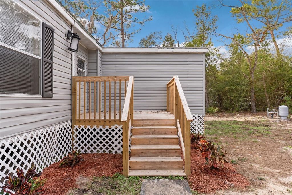 Photo of 6682 SW 156th Place, Dunnellon, FL 34432 (MLS # O6373243)