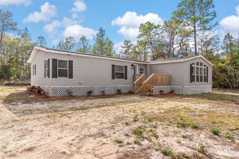 Photo of 6682 SW 156th Place, Dunnellon, FL 34432 (MLS # O6373243)