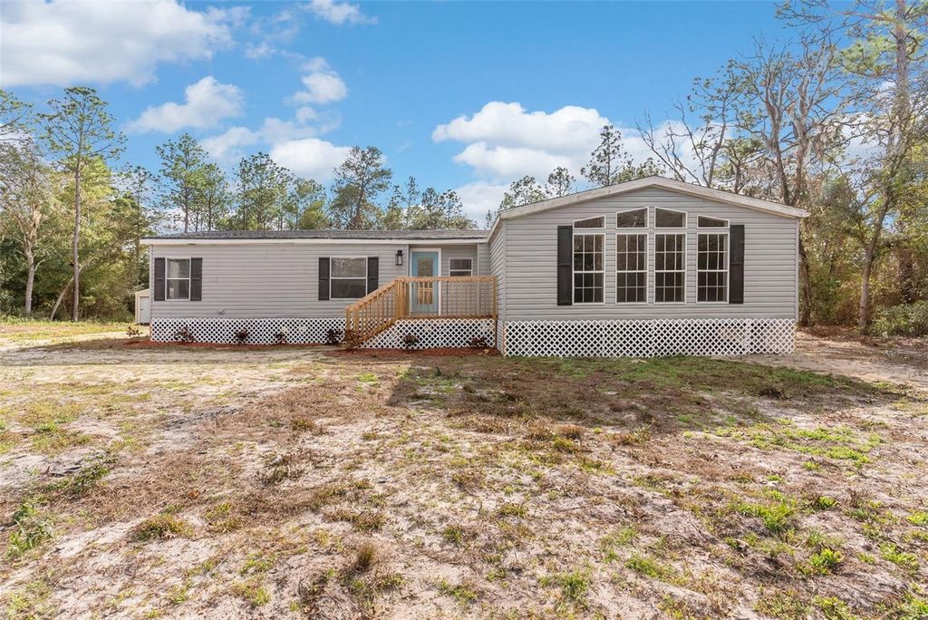 Photo of 6682 SW 156th Place, Dunnellon, FL 34432 (MLS # O6373243)