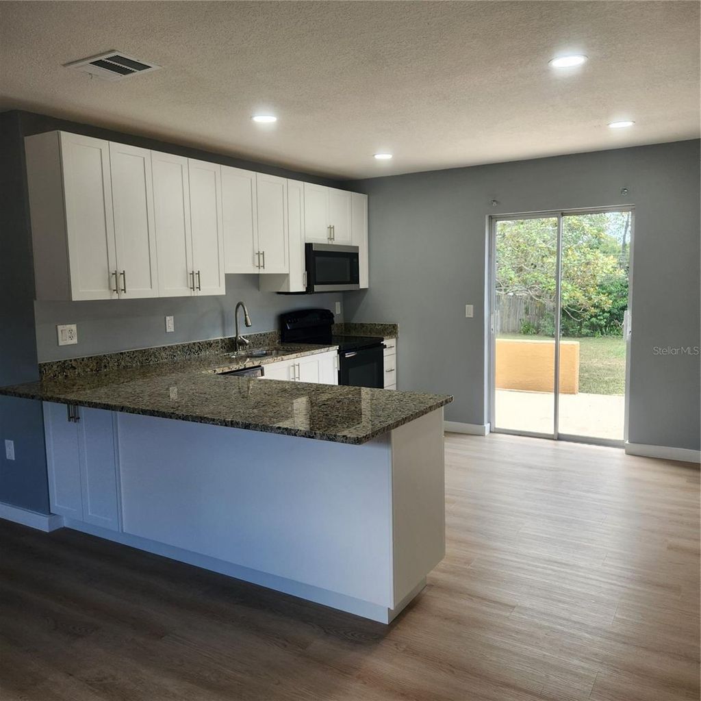 Photo of 12230 Skyler Lane, Spring Hill, FL 34609 (MLS # TB8526211)