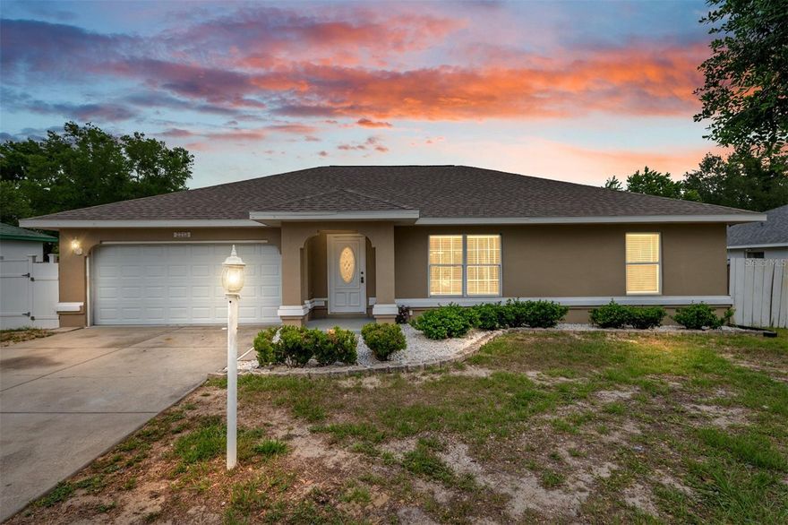 Welcome to this charming single-family home in the desirable Marion Oaks community. NO HOA or CDD! Offering 3 spacious bedrooms, a versatile Den, and 2 full bathrooms. This property provides the perfect blend of comfort and functionality. Step inside to find beautiful tile flooring throughout the entire home-no carpet worries! The bright, open layout is enhanced by the south-facing orientation, which floods the living spaces with natural light. The kitchen shines with granite countertops, making meal prep a pleasure, while the dedicated laundry room comes fully equipped with a brand-new washer and dryer. Recent major updates bring peace of mind: a new roof (2025) and new HVAC (2025). Outside, enjoy a fully fenced backyard that backs directly up to a peaceful tree farm, offering privacy, tranquility, and beautiful green views. Whether you're relaxing with morning coffee or entertaining friends, this outdoor space is a true bonus. This well-maintained home is perfect for families, professionals, or anyone seeking a low-maintenance lifestyle in a great central Florida location. Don't miss your opportunity to call this property home!