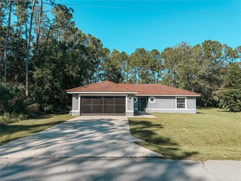 Photo of 21 Randolph Drive, Palm Coast, FL 32164 (MLS # FC313002)