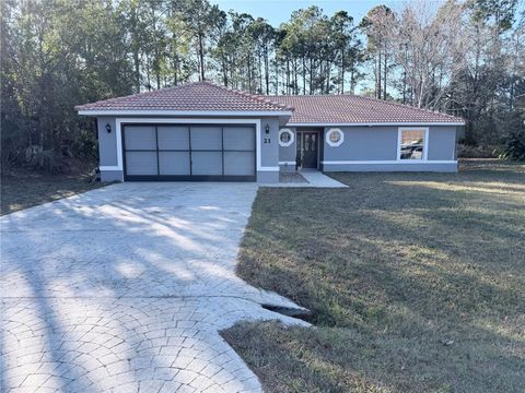 Photo of 21 Randolph Drive, Palm Coast, FL 32164 (MLS # FC313002)