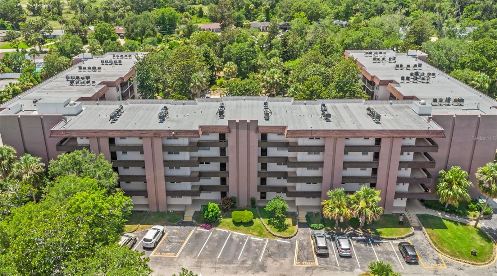 Live like you’re on vacation every day in this beautifully updated 1-bedroom, 1-bath condo featuring a flexible bonus area and a spacious private balcony overlooking the lush courtyard and stunning pool. This unit boasts a newer stainless steel kitchen appliance package, a perfect open-concept floor plan, and plenty of closet space throughout. Nestled on 4.5 acres of beautifully landscaped grounds, this community offers a resort-style lifestyle with a sparkling pool, shuffleboard courts, and outdoor grilling areas. Additional perks include your own assigned parking space, a private interior storage unit, and a tree-shaded dog area for your furry companion—yes, one small dog or cat is welcome! Residents enjoy a full suite of amenities including cable, internet, water, trash, lawn care, pest control, laundry on each floor, clubhouse access, and building insurance, all included in the condo fee. Whether you're a first-time buyer, snowbird, or investor, this is an unbeatable opportunity to own in a park-like setting with everything you need right at your fingertips. Don’t wait—this one is priced to sell fast! All information taken from the tax record, and while deemed reliable, cannot be guaranteed.