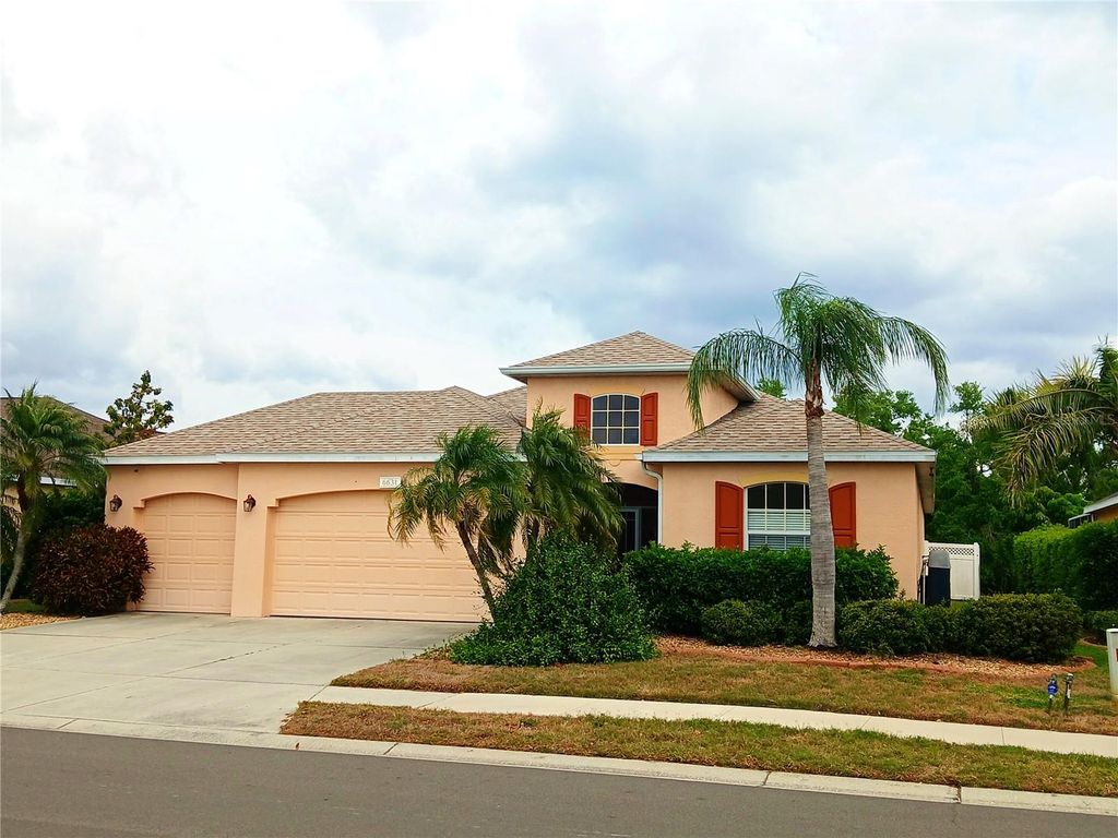 Photo of 6631 63rd Terrace E, Bradenton, FL 34203 (MLS # A4686128)