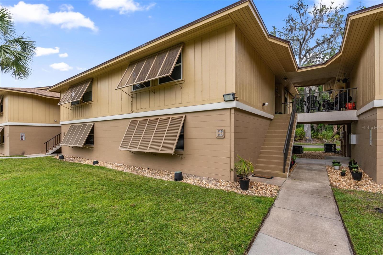 Looking for the perfect blend of comfort, convenience, and location? This beautifully maintained 2-bedroom, 2-bathroom condo offers easy! Whether you're searching for a full-time residence, a weekend escape, or a low-maintenance investment property, this home checks all the boxes. This unit has had over $20k in upgrades done in the last year, both bathrooms completely remodeled, popcorn ceiling removed, and knockdown installed, fresh paint and new baseboards throughout, new outlets installed, granite countertops, new kitchen sink and much more! Tucked in a quiet, friendly community, this unit offers a spacious and functional layout with plenty of natural light throughout. The open-concept living and dining area flows seamlessly into a well-appointed kitchen—making entertaining or relaxing at home a breeze. The primary bedroom suite is a true retreat, featuring a private ensuite bath. The second bedroom and full guest bath provide flexible options for family, guests, or even a home office. You’ll also love the in-unit laundry, private patio/balcony, and designated parking. Just minutes from Lake Monroe – perfect for boating, fishing, hiking, and relaxing. Short drive to parks, trails, restaurants, shopping, and entertainment. Easy access to major roads while still enjoying a peaceful, natural setting. This condo is move-in ready and waiting for you to call it home!