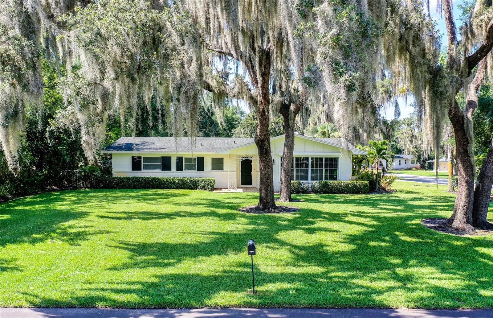 Available Now! Don't miss this charming 3 bed, 2 bath home sits on a corner lot off Lake Butler Blvd. Fully fenced backyard with rear patio area. Rental INCLUDES washer/dryer and private boat ramp access to the Windermere Chain of Lakes. Front door opens to large entertaining space with fireplace and wood laminate flooring throughout. The home offers a spacious 3 car garage and shed in the backyard for a workshop or additional storage. Schedule an appointment to see this property today