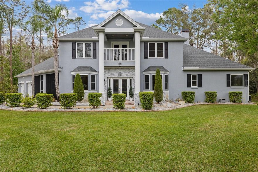 Luxury Living on almost 3 acres of serene and private land, beautifully upgraded 4-bedroom, 3.5-bathroom estate. This exquisite home seamlessly blends modern upgrades with timeless elegance, offering the perfect retreat while remaining close to everything you need. Step inside to brand-new floors, a freshly painted kitchen with an upgraded tile backsplash, and a stunning stone accent wall in the half bath. The living room and master bedroom feature custom stonework around the fireplaces, adding warmth and sophistication with a built-in entertainment media center. The office space and upstairs family room provide versatility, perfect for remote work, a playroom, or even a movie theater. Enjoy peace of mind with a brand-new roof, new hurricane windows and front entry doors, a new septic system, a drain field, and a Culligan water softener. The new upstairs AC, ceiling fans, and LED recessed lighting enhance comfort and efficiency.

Step outside to your private oasis, featuring a pool with a newly installed pump, brand new Jacuzzi, heater, and 360-degree landscape lighting, perfect for relaxing or entertaining. The two-car garage provides ample storage, and the new water pump ensures seamless functionality. This home offers the ultimate combination of luxury, privacy, and modern convenience. Don't miss this rare opportunity. Schedule your showing today!