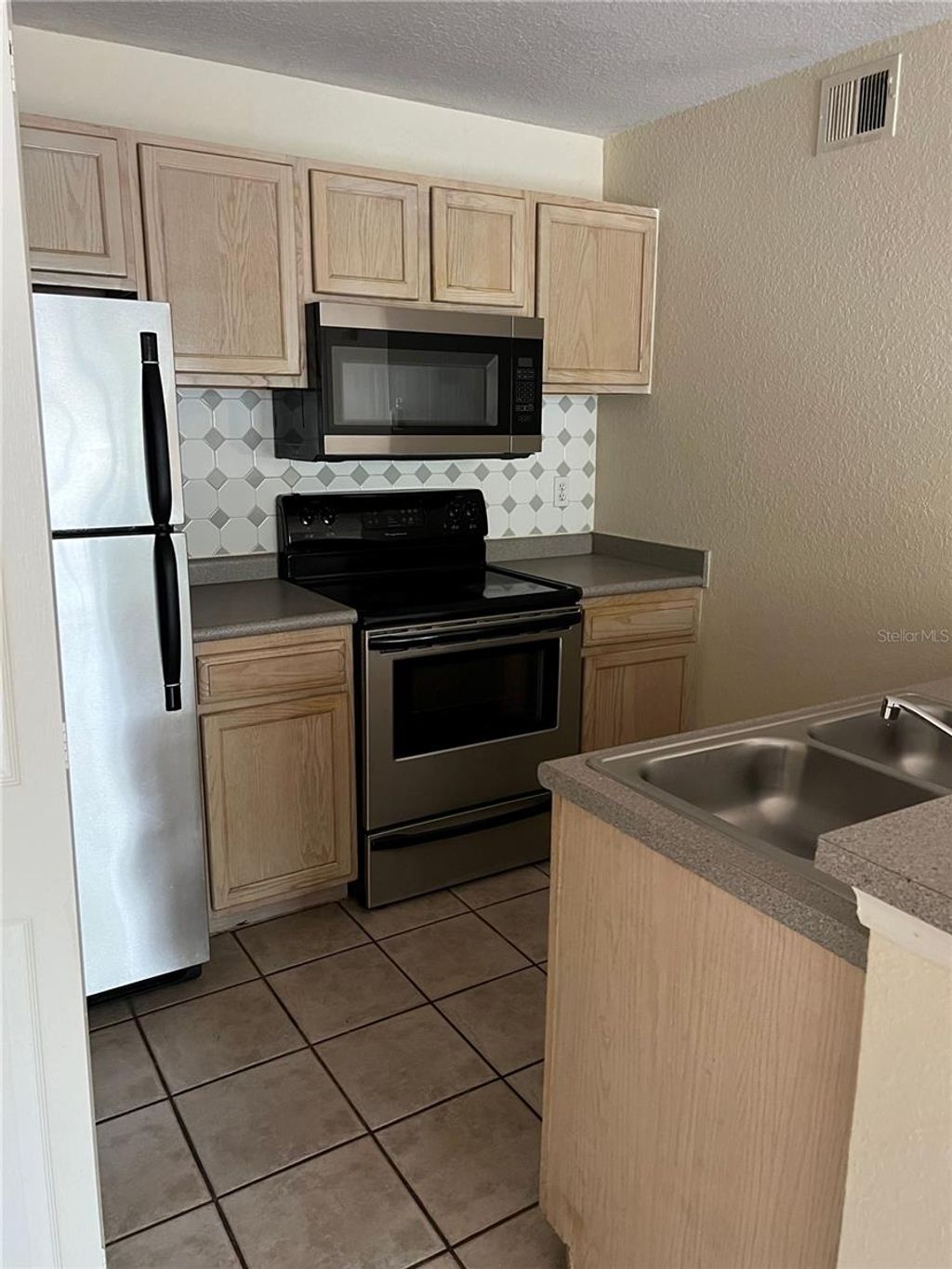 Photo of 8939 Latrec Avenue #1203, Orlando, FL 32819 (MLS # S5145785)