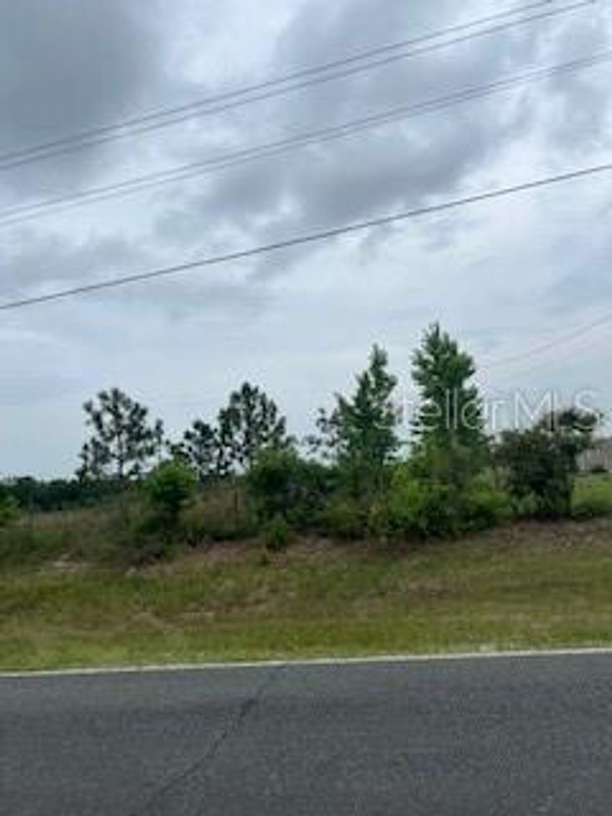 Lovely 5 Acre tract to build your dream home. Lot is mostly cleared and located on paved road. Quiet country setting yet short distance to shopping, restaurants and local conveniences.