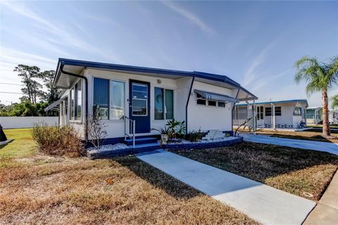 Photo of 7 Drury Lane, Tarpon Springs, FL 34689 (MLS # TB8451969)