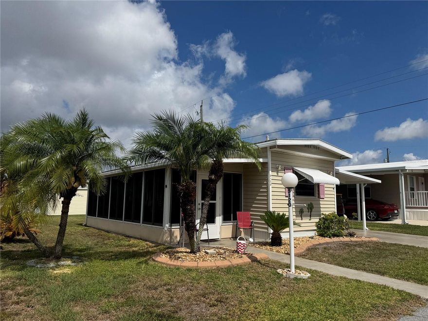 Welcome to Golf Lakes Estates, a gated 55+ resident owned community offering comfort, convenience, and resort style living in the heart of Bradenton. This beautifully maintained and move in ready 2 bedroom, 1 bathroom home is perfect for enjoying the Florida lifestyle with low monthly fees and valuable homestead tax advantages.

Step inside to discover a bright and inviting interior featuring spacious living areas, including a comfortable living room and an expansive Florida room filled with natural light from an abundance of windows. The thoughtful floor plan offers excellent flow for both relaxing and entertaining. The bathroom is designed with dual access, featuring one private entrance from the primary bedroom and another from the hallway, allowing convenient access for both the primary and guest bedrooms while maintaining privacy. The bathroom also includes a tub and shower combination.

The primary bedroom features his and her closets, while the guest bedroom offers comfortable accommodations for visitors or additional living space. Two convenient entrances to the home include a welcoming front entry through the Florida room and a side entrance beneath the covered carport for everyday ease. The attached oversized shed provides exceptional storage space along with an indoor laundry area, offering plenty of room for tools, bikes, beach chairs, and more.

Beyond the home itself, residents enjoy beautifully landscaped surroundings and an impressive selection of amenities that make Golf Lakes Estates such a sought after community. The maintenance fee includes water, sewer, trash pickup, cable TV, and WiFi, creating easy and affordable living, with optional lawn service also available for added convenience.

Residents enjoy year round access to outstanding amenities including a heated 40 x 60 pool, relaxing Jacuzzi spa, private par 3 nine hole golf course, fitness center with sauna, lighted pickleball courts, covered shuffleboard courts, lawn bowling courts, horseshoe pits, and fishing throughout four scenic lakes. The active clubhouse serves as the social center of the community and features a large convention hall, commercial kitchen, library, billiards room, card rooms, craft room, and a full calendar of clubs, activities, and social events.

Conveniently located near shopping, dining, medical facilities, and Gulf Coast beaches, Golf Lakes Estates offers easy access to many of the area’s most popular destinations including Anna Maria Island, Siesta Key Beach, Robinson Preserve, LECOM Park, and the vibrant shopping, dining, and arts scenes of downtown Bradenton and Sarasota. Travel is also incredibly convenient with Sarasota Bradenton International Airport located just 7 miles away.

Experience the best of active retirement living in one of the Sarasota Bradenton area’s most sought after communities. Schedule your private showing today.
