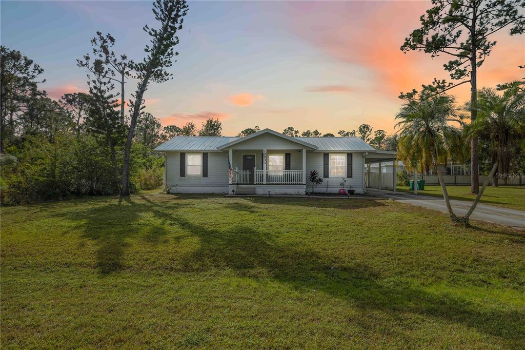 Photo of 12233 Caravan Drive, Punta Gorda, FL 33955 (MLS # A4674403)