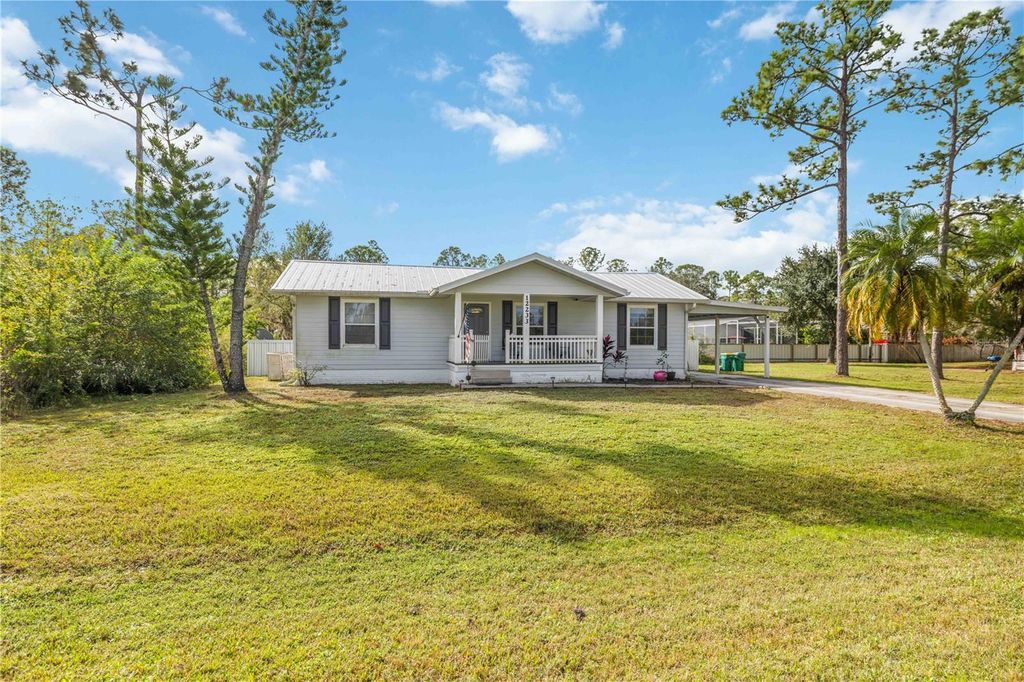 Photo of 12233 Caravan Drive, Punta Gorda, FL 33955 (MLS # A4674403)