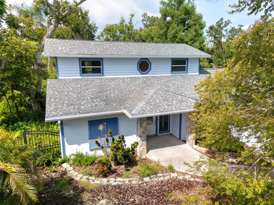 Welcome to 4127 Mallard Drive, a custom craftsman-style home solely built for the present owner. A well-kept gem in the heart of one of Safety Harbor’s most desirable neighborhoods. This 3-bedroom, 2-bathroom home offers 1,784 square feet of comfortable living space on an expansive 10,193 sqft lot—perfect for anyone who values both indoor comfort and outdoor potential. From the curb, the property makes a strong first impression with its classic Florida architecture, mature landscaping, and inviting entryway. As you enter through the front door, you will appreciate the layout, giving you the flexibility for entertaining, working from home, or creating play space. The kitchen is ready for your personal touch—functional now, but brimming with potential for a modern refresh. The big sliding door from the living room leads to a gigantic balcony, overlooking the gorgeous natural landscape in the backyard. Bedrooms are generously sized with the 2nd and 3rd located on the first floor, and the primary bedroom stretching through the whole second floor with the en-suite bathroom and a walk-in-closet, plus a balcony overlooking the backyard. The lot offers plenty of room for a pool, garden, or a playground. It’s a space with real possibilities. Situated minutes from charming downtown Safety Harbor, Philippe Park, and Tampa Bay’s waterfront, you’ll enjoy a blend of Florida small-town charm and easy access to shopping, dining, beaches, and commuter routes. 4127 Mallard Drive is ready for its next chapter—whether you move in as-is or elevate it with your own style, you’ll be getting a solid, well-located home with room to grow.