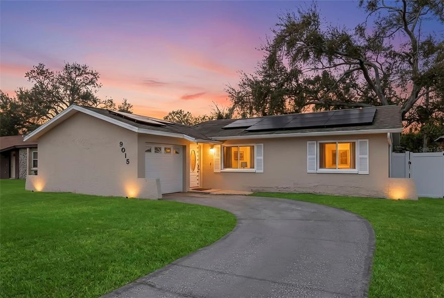 On a quiet street in Starkey Heights, you’ll find this charming 3 bedroom, 2 bathroom home filled with warmth and thoughtful updates. Step inside to vaulted ceilings, abundant natural light, and a built-in entertainment center complete with shelving and an electric fireplace, creating a welcoming focal point in the main living area. The open-concept layout places the living room at the heart of the home, flowing seamlessly into the dining area and galley-style kitchen. Updates include vinyl flooring throughout the main living spaces, stainless steel appliances, a spacious walk-in primary bedroom closet, and an abundance of storage throughout the home, offering both style and functionality. The outdoor space is just as inviting. A completely private screened-in patio, conveniently located off the kitchen and dining area, is perfect for morning coffee, evening wine, or hosting friends and family while enjoying your fully vinyl-fenced in backyard. Additional highlights include an oversized driveway, one-car garage with laundry, and close proximity to the Pinellas Trail for walking and biking. Conveniently located near the Bardmoor YMCA, shopping, and dining, and just a short drive to the beaches, downtown St. Petersburg, or Tampa, this home offers comfort, convenience, and the best of the Florida lifestyle. For your convenience, the home’s solar panels provide added energy efficiency, with electricity included in the rent, offering both sustainability and monthly savings!