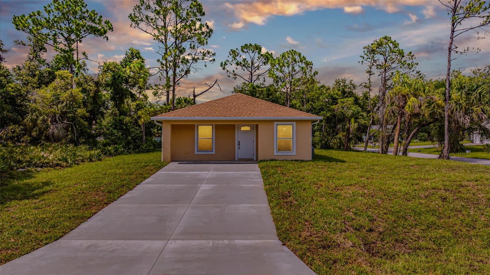 Welcome to this stunning brand-new construction 3-bedroom, 2-bathroom home offering 1,116 square feet of stylish functional living space on a generous 0.24-acre corner lot. Located in a peaceful, non-HOA neighborhood, this 2025 construction is move-in ready and designed to suit a variety of lifestyles—whether you're looking for a primary residence, a seasonal getaway, or a smart investment opportunity. Step inside and be greeted by an open-concept floor plan where the spacious living area and modern finishes flow seamlessly throughout. Elegant wood look vinyl flooring extends throughout the home, including the bedrooms, creating a cohesive and polished look. Hurricane Impact Windows offer peace of mind through the ever changing Florida Seasons. The heart of the home is the kitchen, featuring sleek white shaker cabinetry, stunning quartz countertops, and brand-new stainless steel appliances—perfect for cooking, casual meals, or entertaining guests. The spacious primary bedroom is a true retreat, offering a large walk-in closet and a private en-suite bathroom. Two additional bedrooms provide ample space and share a well-appointed bathroom. For added convenience, the home also includes a dedicated laundry room with washer and dryer hookups and extra storage. Beyond the home, enjoy the freedom of living without HOA restrictions while being just minutes from shopping, dining, and a short drive to Florida’s beautiful Gulf Coast beaches. Schedule your private tour today and experience the perfect blend of comfort, style, and convenience.