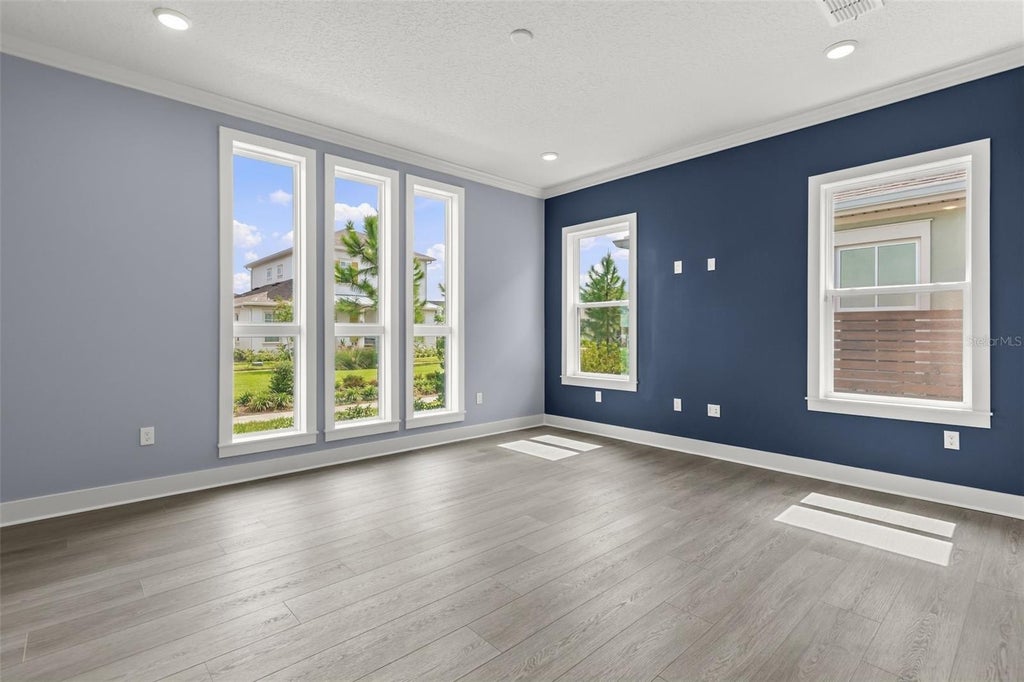 Photo of 10061 Gobat Alley, Orlando, FL 32827 (MLS # O6446174)