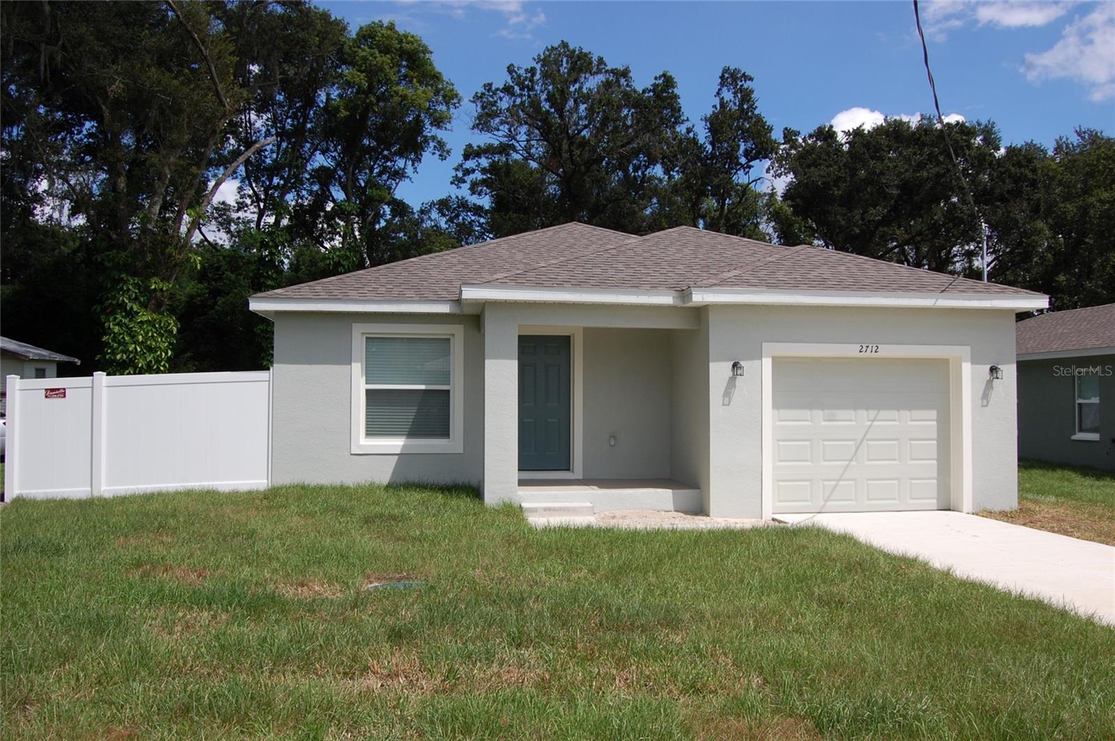 NO HOA! NEW CONSTRUCTION! This brand new block home in Lakeland, FL offers 3 bedrooms, 2 full bathrooms. Open floor plan with laminate in all living areas and carpet in the bedrooms. The openness continues to flow through the kitchen and dining area. Beautiful white shaker cabinets in kitchen and bathrooms. Stainless steel appliances. Indoor laundry closet with washer/dryer hook-ups. An enclosed 1-car garage and fenced back yard finishes off this beautiful new home. The pictures being used are of another home, which is the same model as this listing.