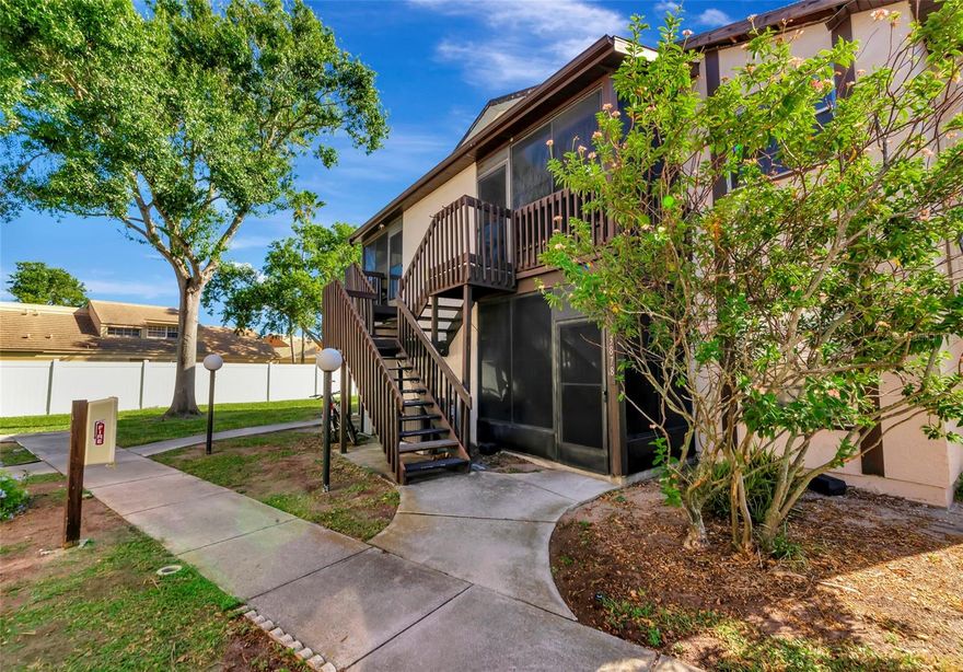 This warm and inviting second-floor condo offers 2 bedrooms and 2 bathrooms, perfectly blending comfort and convenience in a prime location near State College of Florida and IMG Academy. Enjoy quick access to local dining, shopping, and entertainment. The home features newly installed LVP flooring throughout, a spacious living area, and a primary bedroom with a large walk-in closet. Additional updates include a new A/C unit and newly installed bathroom fixtures. The screened-in porch provides extra storage along with a washer and dryer. Residents enjoy community amenities such as a pool, spa, fitness center, and tennis courts. Association approval requires a minimum 700 credit score. Please note, the condo association is in the process of renovating the exterior paint and stairways; this assessment has already been paid by the current owner and will be completed in the near future.