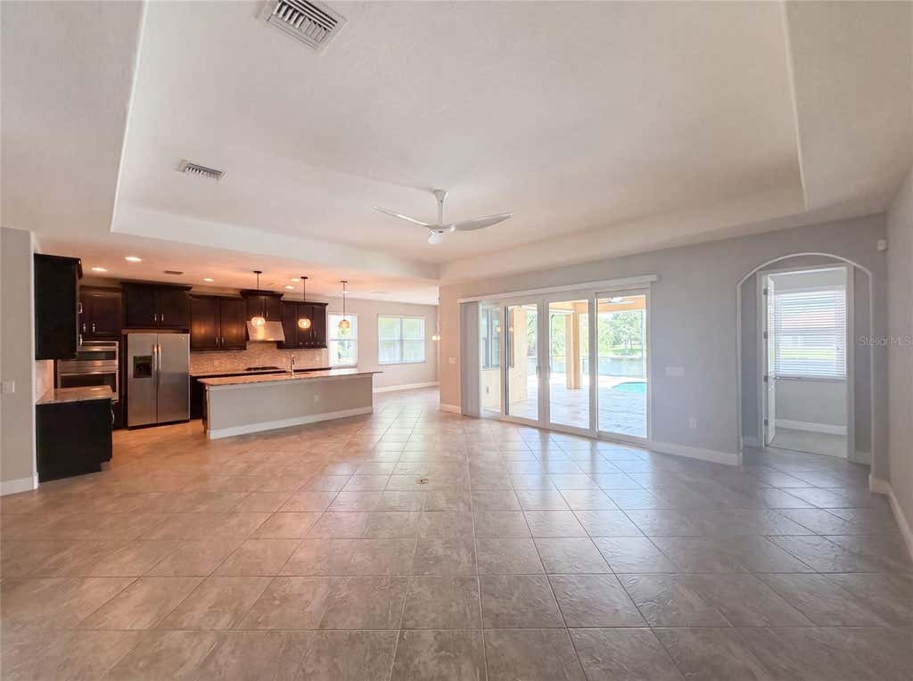 Photo of 2575 Grand Lakeside Drive, Palm Harbor, FL 34684 (MLS # O6427814)