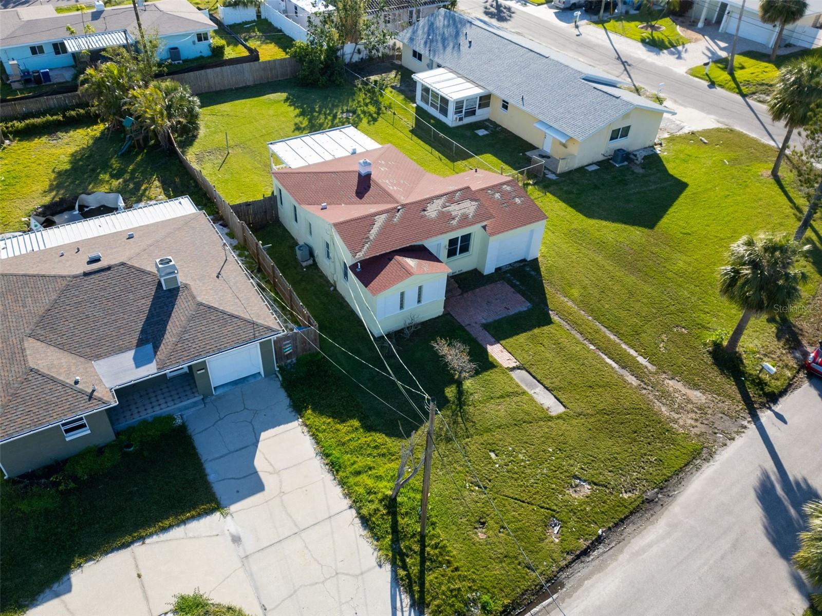 Located in the highly sought-after Redington Shores Beach, this 8,803 sqft lot is a wonderful opportunity for a brand-new custom home! The existing structure was damaged by a storm and is being sold As-Is for land value, making it the perfect chance to create your dream residence. Enjoy partial harbor views in a neighborhood booming with luxury development, where multi-million-dollar homes are transforming the area. Just minutes from Redington Beach, this is a prime investment in one of the Gulf Coast’s hottest markets. Quotes from builders are available upon request!