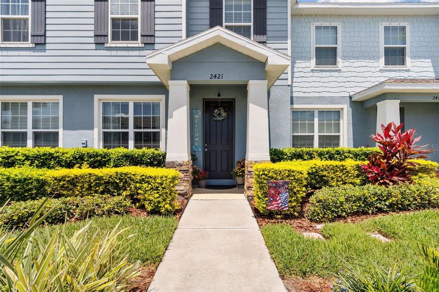 Welcome to 2421 Hearth Drive in the highly sought-after Asturia community, where style, comfort, and smart buying come together beautifully. This largest-model townhome offers exceptional value with a lower monthly HOA and a truly move-in ready experience that feels like new construction, without the wait.

Inside, you’ll find three spacious bedrooms, two and a half bathrooms, and an upstairs laundry room designed for everyday ease. The two-car garage with a full driveway and ceiling-mounted storage racks adds functionality buyers truly appreciate. Thoughtful upgrades like crown molding, designer lighting, and custom closet systems elevate the home beyond builder-grade.

The gourmet kitchen is a standout feature, complete with stainless steel appliances, upgraded cabinetry, a custom backsplash, and a large island perfect for gathering. Just outside, a private courtyard creates a peaceful space for relaxing or entertaining.

This home also delivers on efficiency and long-term savings with a tankless water heater, water softener, and advanced HVAC air purification system.

Location is where this home truly shines. Just minutes from the Suncoast Parkway, commuting to Tampa International Airport, downtown Tampa, and major business hubs is seamless, making travel, work, and weekend plans incredibly convenient. You’re also close to everything you need for daily living, including the Tampa Premium Outlets, top-rated shopping, dining, grocery stores, fitness studios, and entertainment options. Whether it’s a quick Target run, dinner out, or a full day of shopping, everything is within easy reach.

With exterior maintenance, roof care, and lawn service included, you can enjoy a low-maintenance lifestyle while taking full advantage of Asturia’s resort-style amenities and unbeatable location. This is the kind of opportunity that checks every box...value, convenience, and lifestyle.