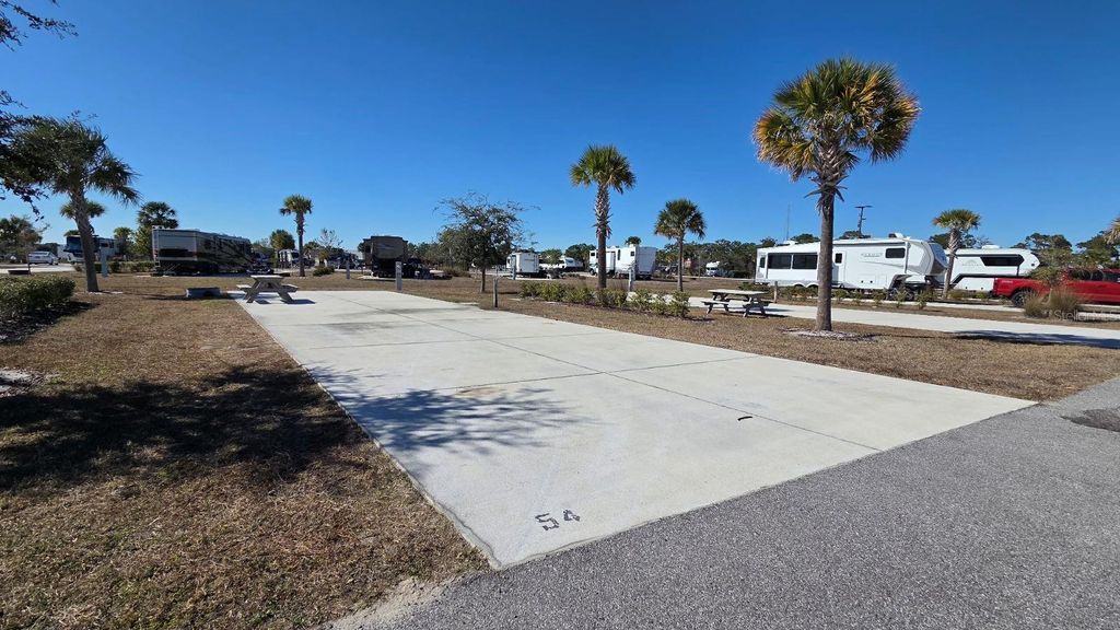 Photo of 54 Tiki Turn E, Lake Wales, FL 33898 (MLS # TB8470519)